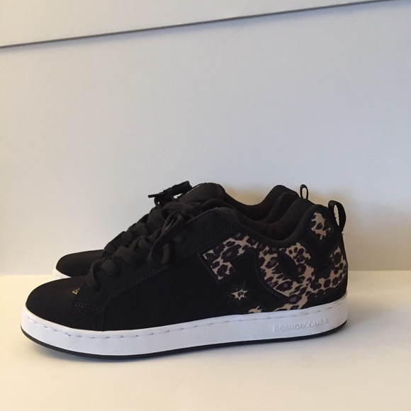 black and gold dc shoes